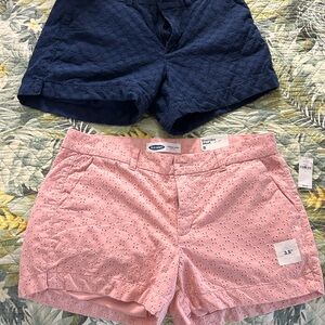 Old navy shorts, size 8, 1 navy and 1 blue.  1 pair is new with tags